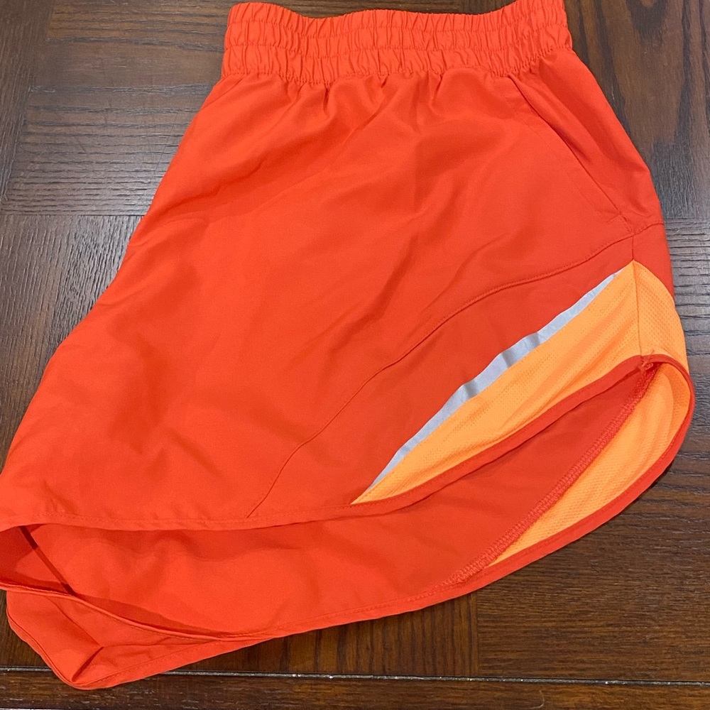 Blazed and Orange running shorts